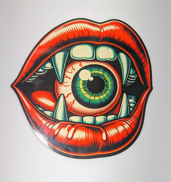 Lips and Eyeball wreath sign